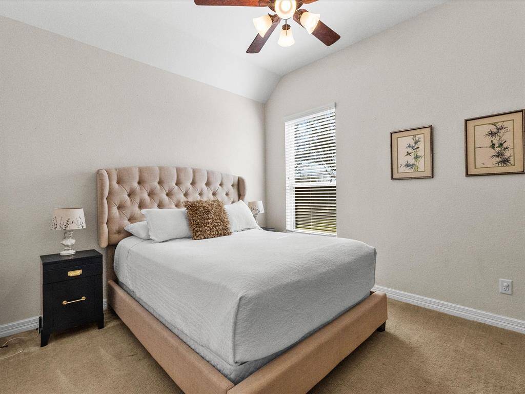 Bedroom 4 is spacious and features views of backyard oasis!