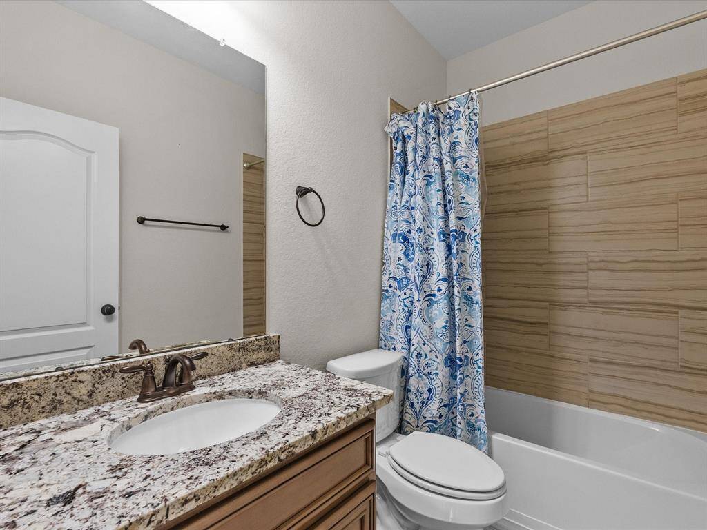 Full bathroom #3 features an beautiful vanity, and a clean and modern design.