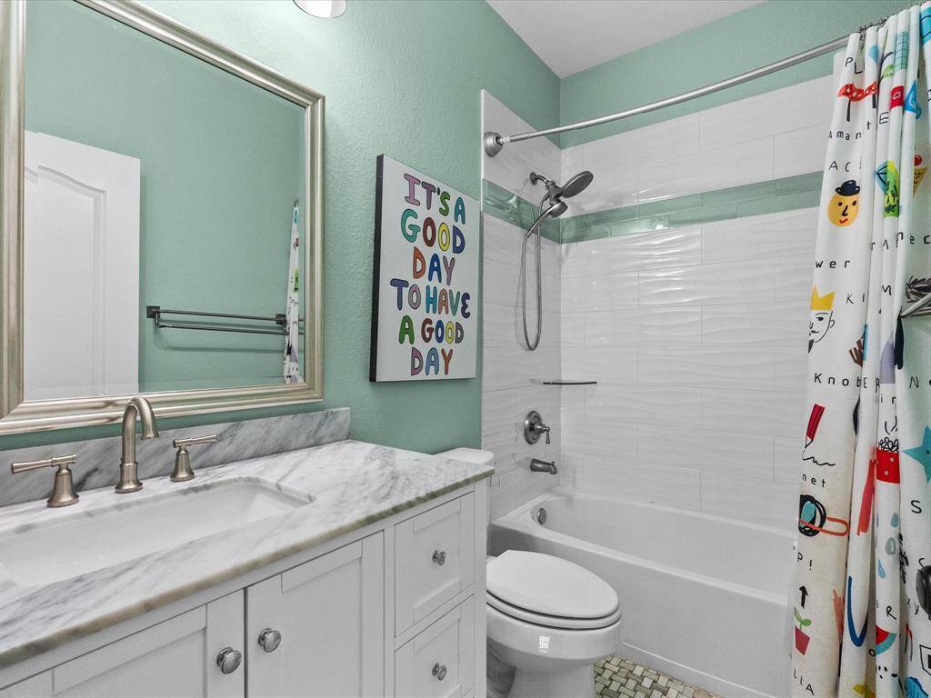 Bathroom 2 has gorgeous vanity counter, intricate tile flooring!