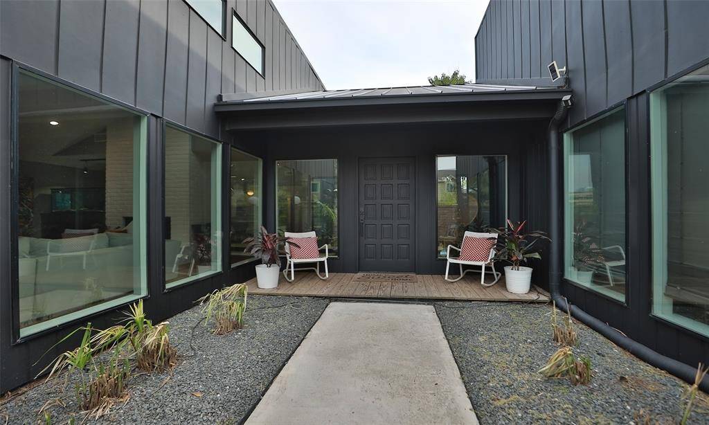 Welcome to your new modern architecture home! Exquisite front entrance with native plants that will soon sprout to life!