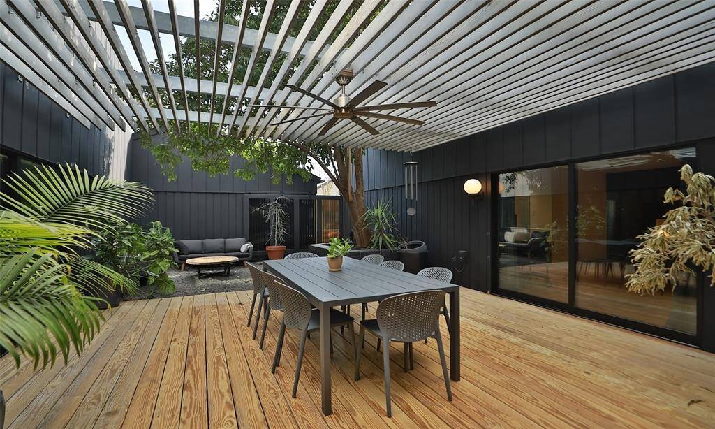 Finally! Step outside into your outdoor atrium! The house wraps around this outdoor area, surrounding it on all 4 sides with a sliding door to the backyard.