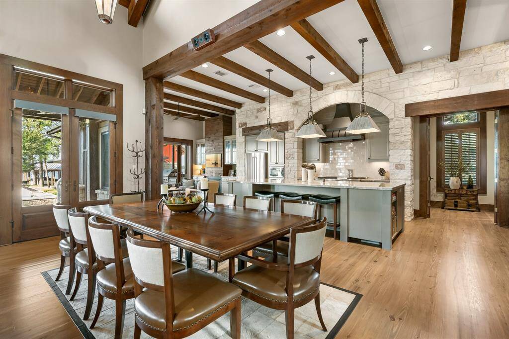 Note there are 10 chairs with 8 on the sides and more than enough room to walk around demonstrating the spaciousness of this dining area!