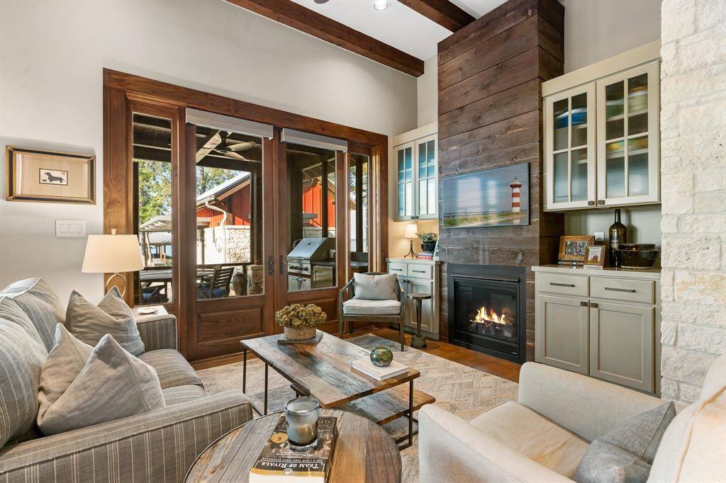 This Flex Room opens to a screened outdoor living/cooking area! Note the additional storage cabinets here.