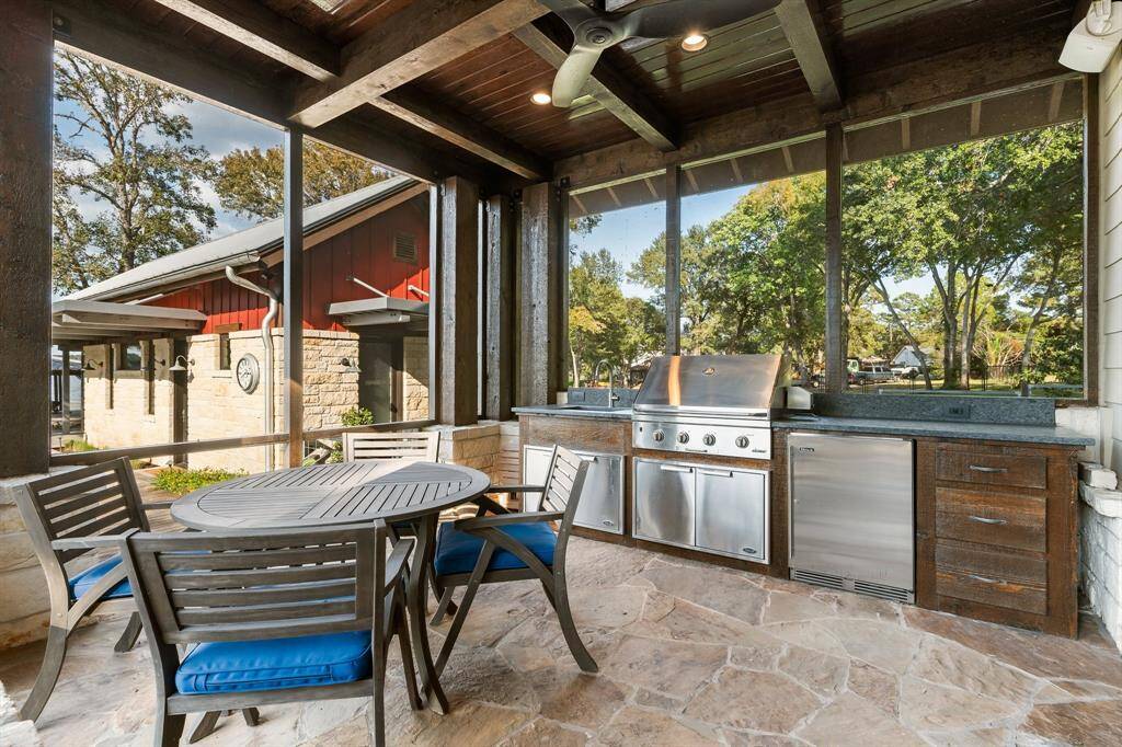 Screened pool and lakeside outdoor eating and gathering area.