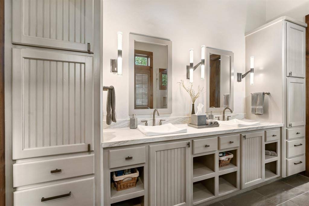 Primary bath has a spacious easy-flow design with abundant storage.