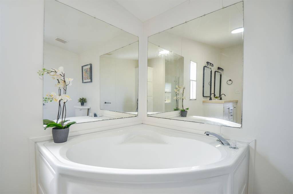 Oversized updated soaking tub.