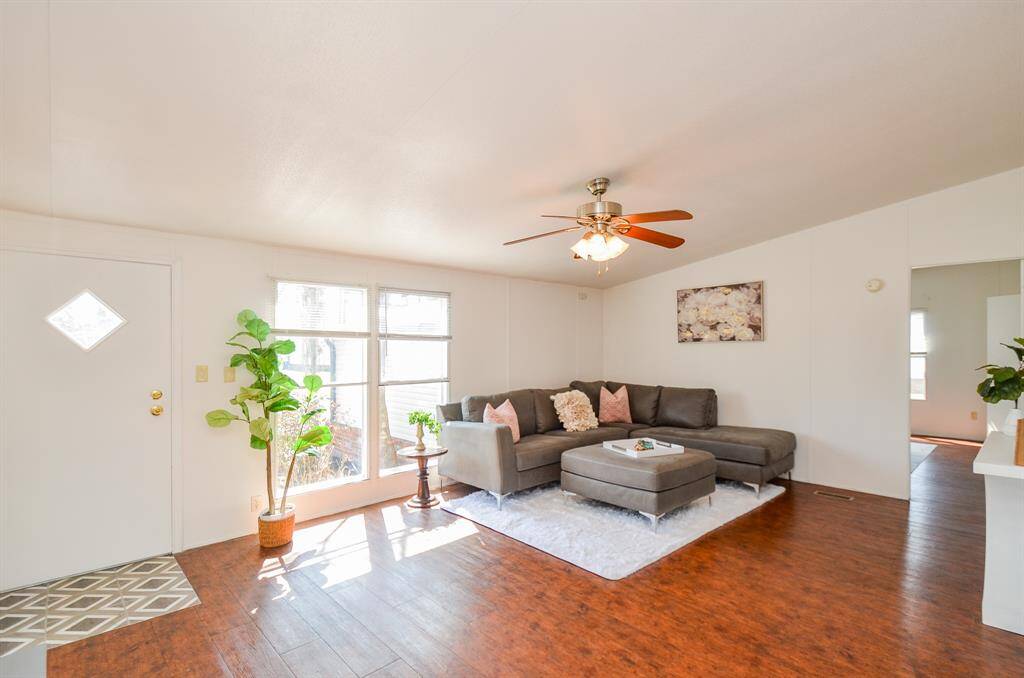 Large living room overflowing with natural light