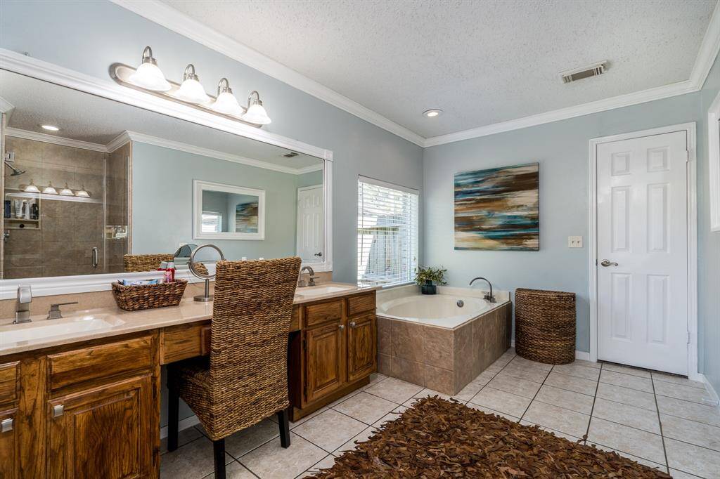 The bath has been completely remodeled and provides plenty of room for you to to prepare for the day in comfort.
