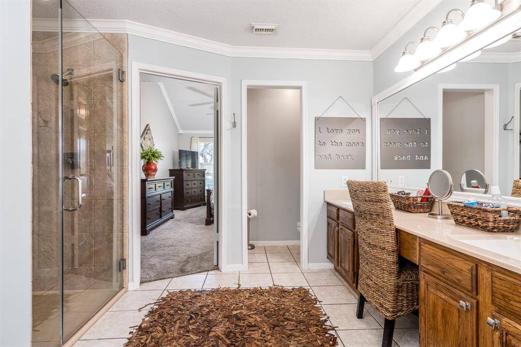 Another look at the master bath, this time looking out towards the bedroom. You can see the shower on the left side of the photo.