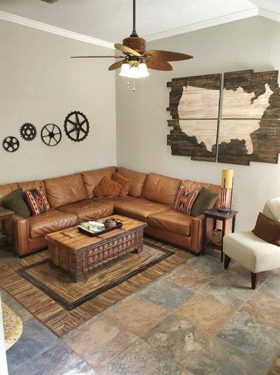 From the back corner of the house and looking back the way you came - this room is surprisingly large! The sofa in this picture is easily contained in the space.