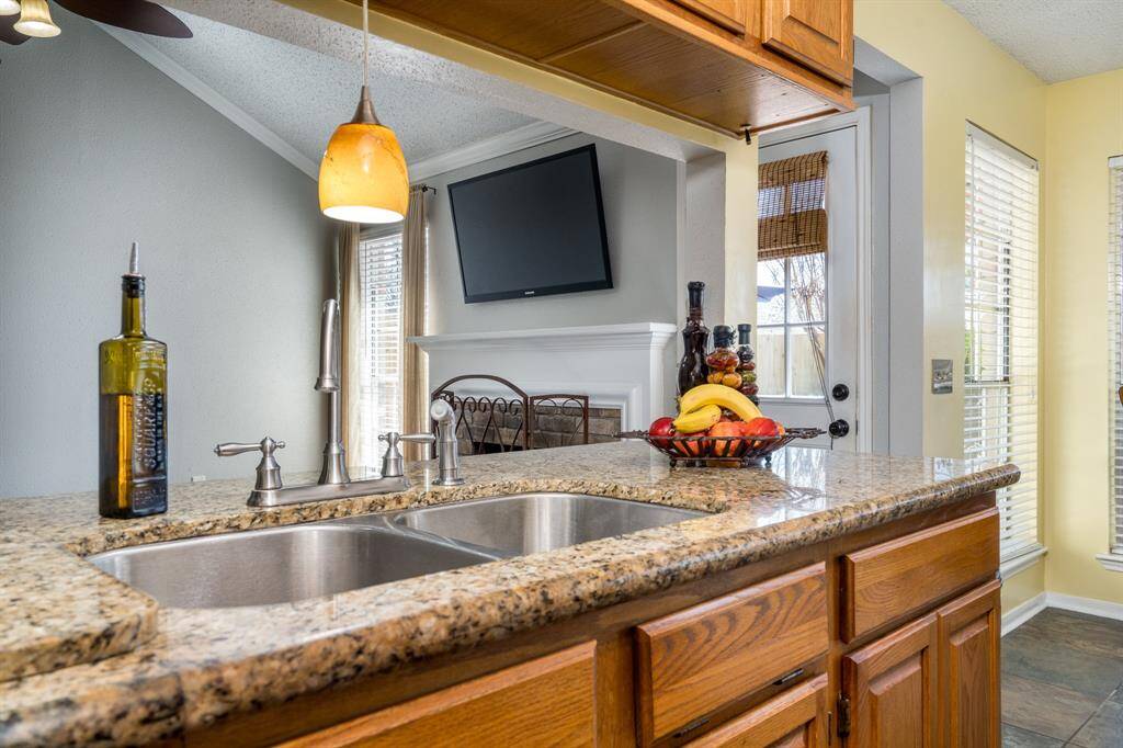 You'll love working with the granite counter tops and the space provided!