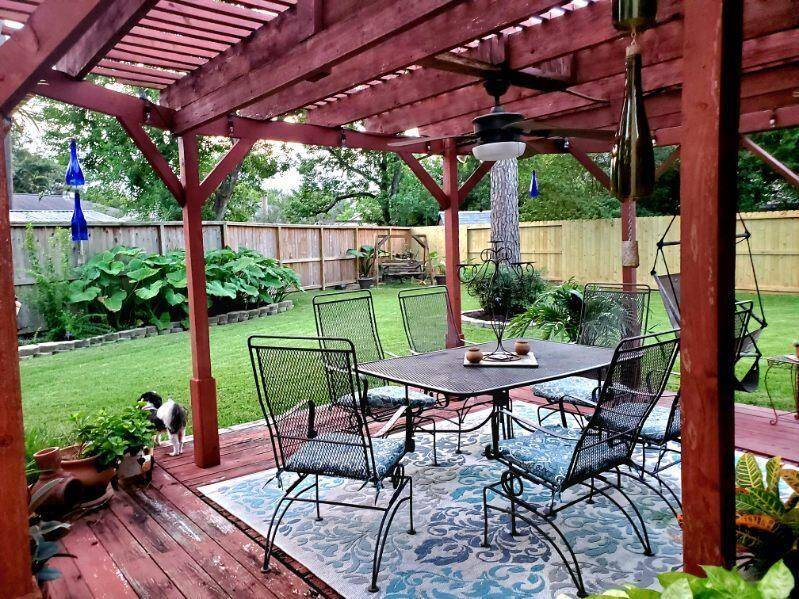 Stepping outside the back door, you are greeted by the large covered back deck. This is an IDEAL place to sit and enjoy a glass of wine at the end of the day, or to entertain guests!