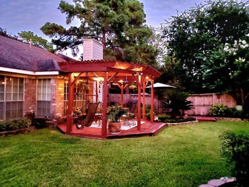 Here's a pulled back picture of the deck, showing how it sits on the LARGE lot.