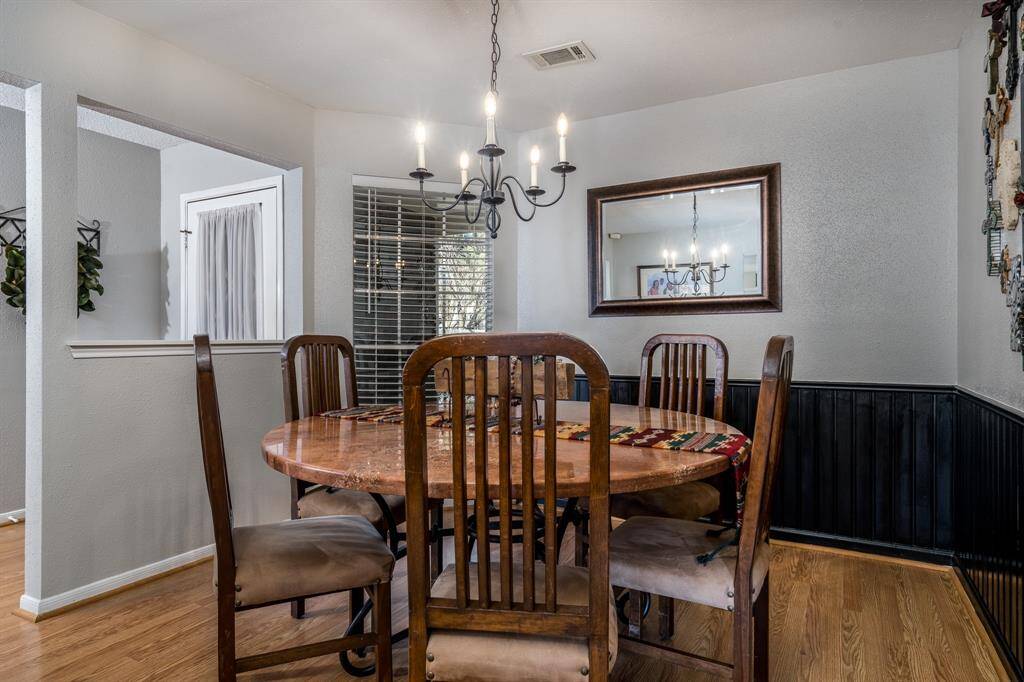 Sometimes, pictures can be deceiving! This space is quite large and holds this massive round table perfectly!