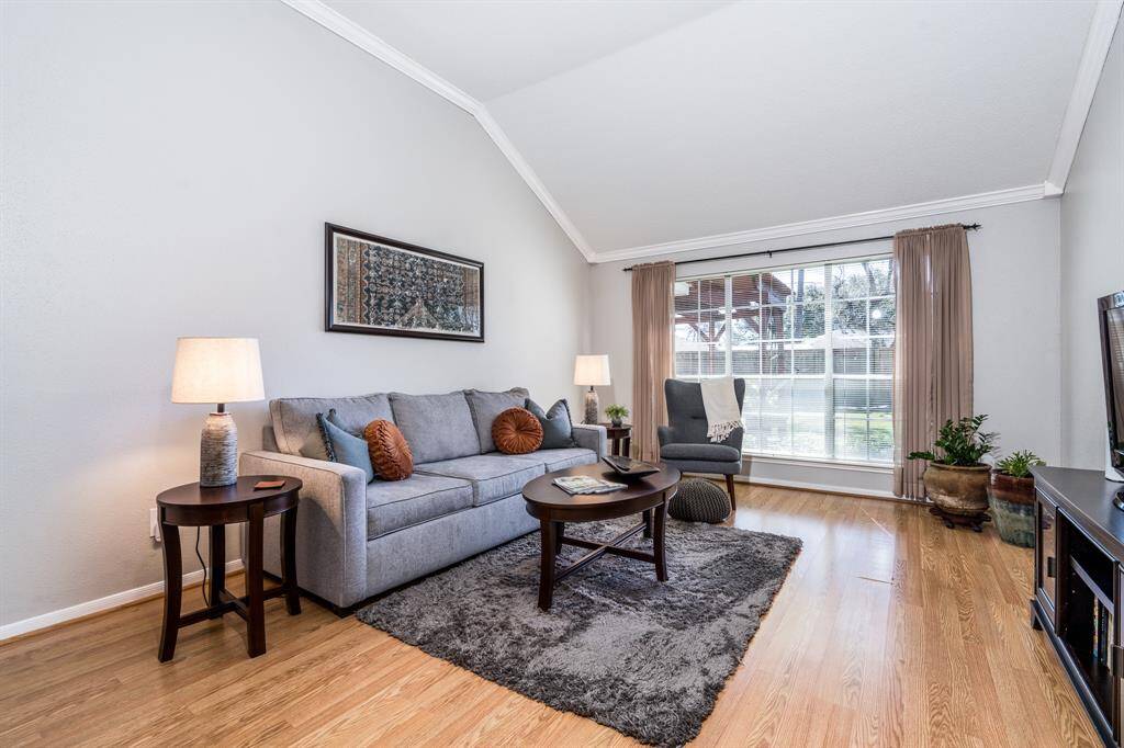 Here's a better look at the family room. The laminate floors brighten this room up and provide a maintenance-light surface for cleaning. The window overlooks the back yard so you can keep track of pet, children or guests back there.