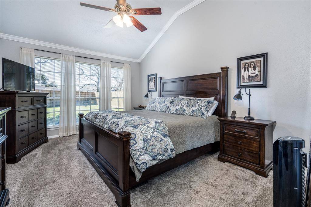 The master bedroom is tucked away, and yet has plenty of room for large furniture! See how easily it accommodates this large bedroom suite?