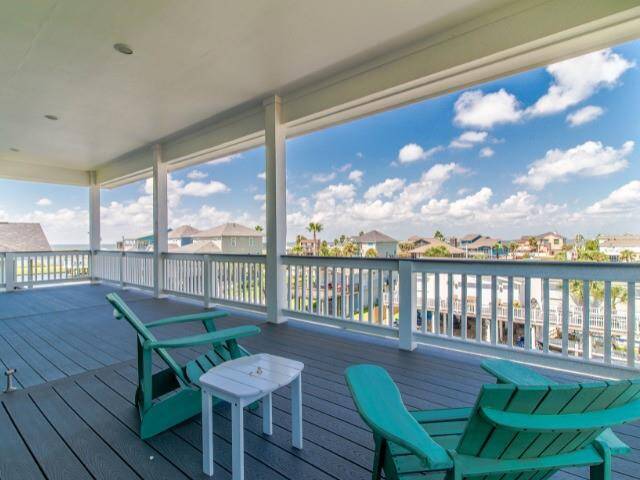 The spacious 3rd floor deck offers views of the bay & incredible sunsets.  Sits higher than most of the surrounding homes for magnificent views.  Located right off the French Doors in the Flex room.