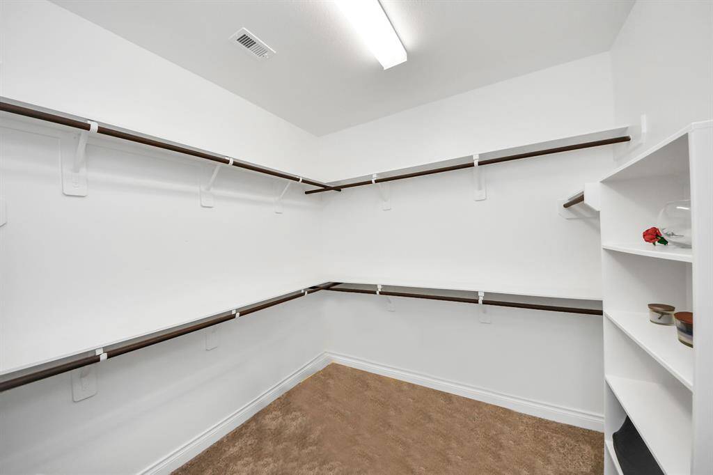 This is just ONE of TWO primary closets.