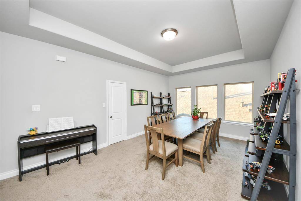 Gameroom has ample space for games, pool table, or anything else that keeps people playing