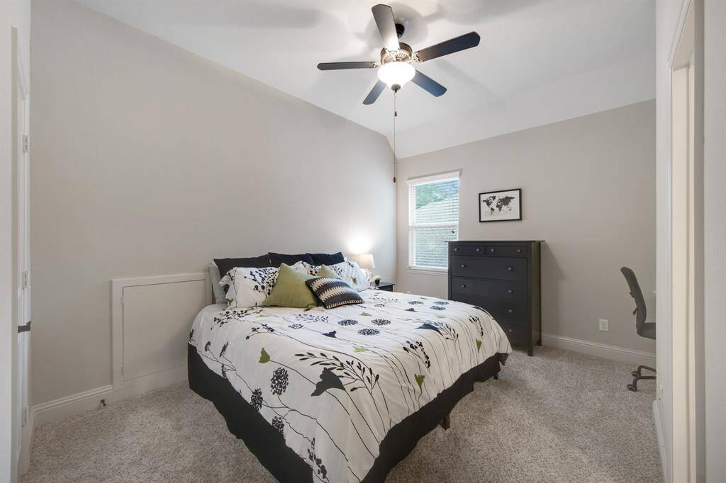 First upstairs bedroom with 5 blade ceiling fan and plush carpet, Wi-Fi booster