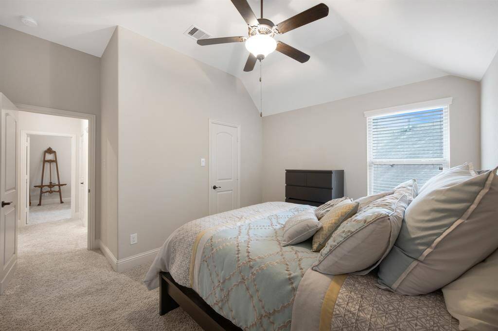 Another view of secondary bedroom and walk-in closet