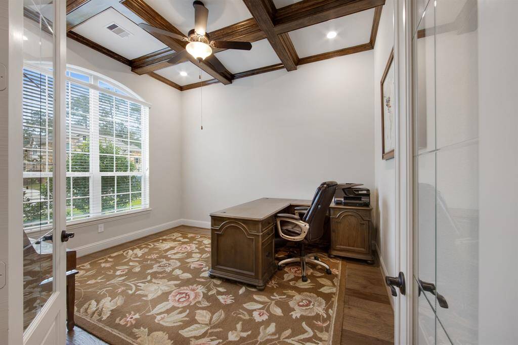 Study with Coffered ceiling stained wood, glass French doors