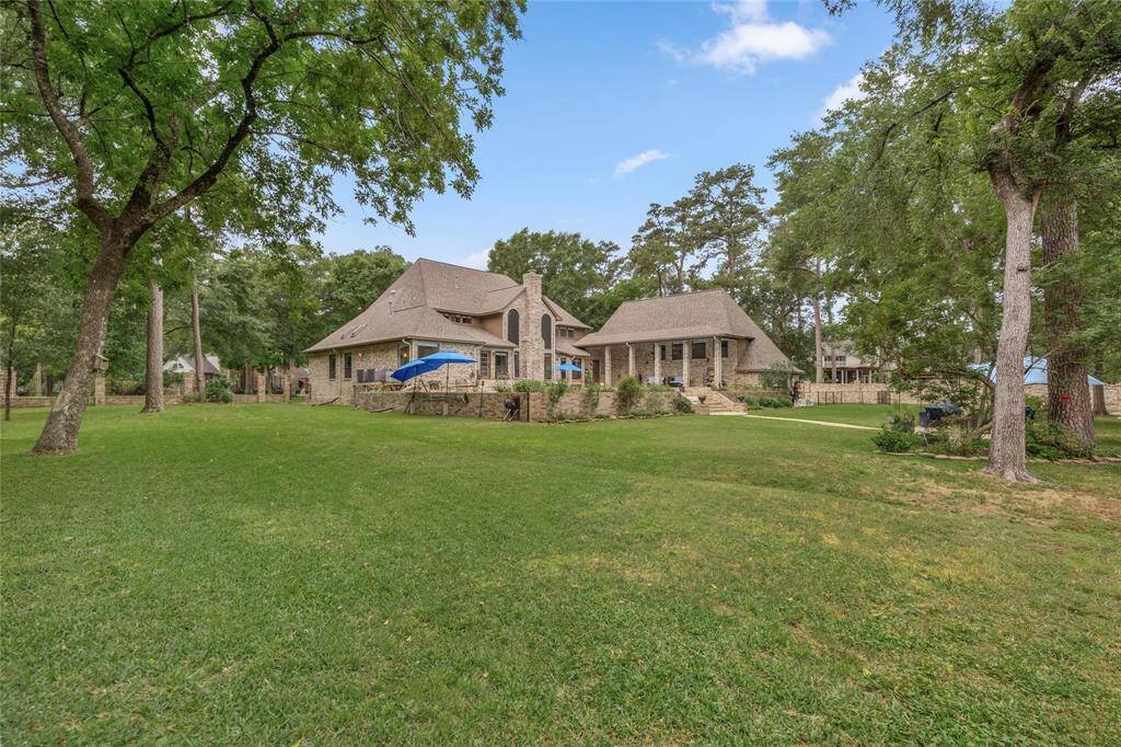 Discover this elegant home with a spacious layout, nestled in a serene, private setting. Enjoy a large, well-kept lawn surrounded by mature trees—perfect for nature lovers seeking tranquility.