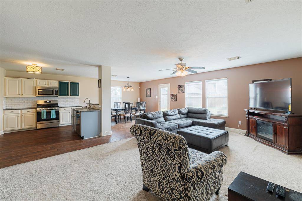 Another view showing the open family and kitchen areas.