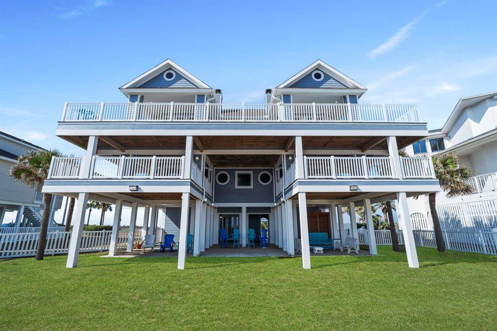 Multiple balconies overlook the water.