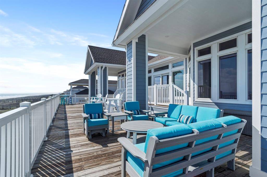 Multiple balconies overlook the water.