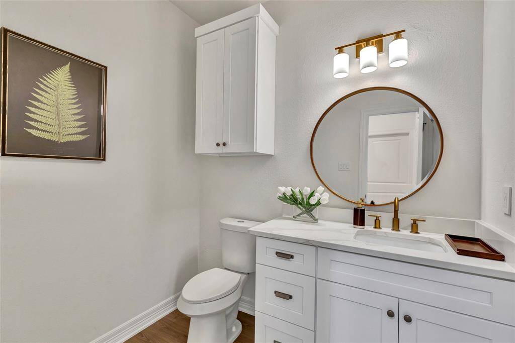Conveniently located off the garage entry, this mudroom bench offers ideal shoe storage and extra space.