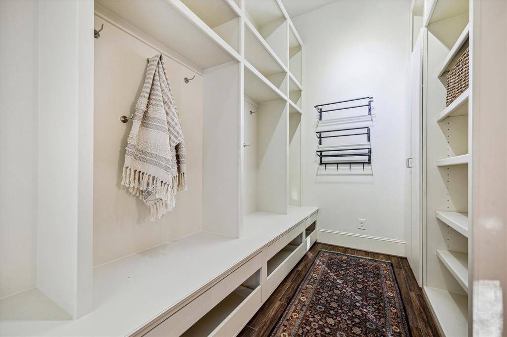 Conveniently located right inside the door leading in from the 2-car attached garage, the mudroom serves as the perfect drop zone to help the rest of the house remain organized and clutter free.