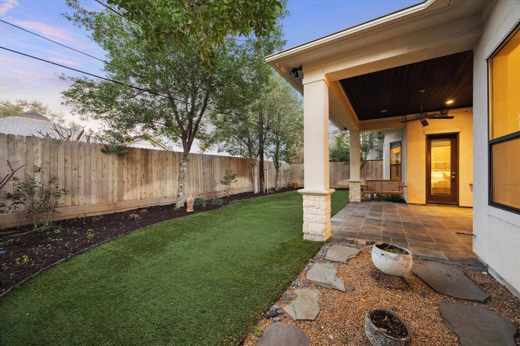 This low-maintenance, turfed backyard provides the ideal space for your loved ones to run, play, and enjoy outdoor fun.