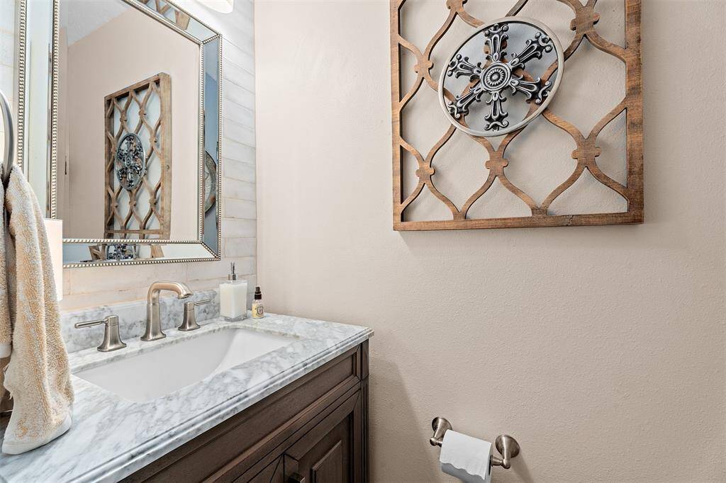 Convenient half bath on the main floor, perfect for guests.