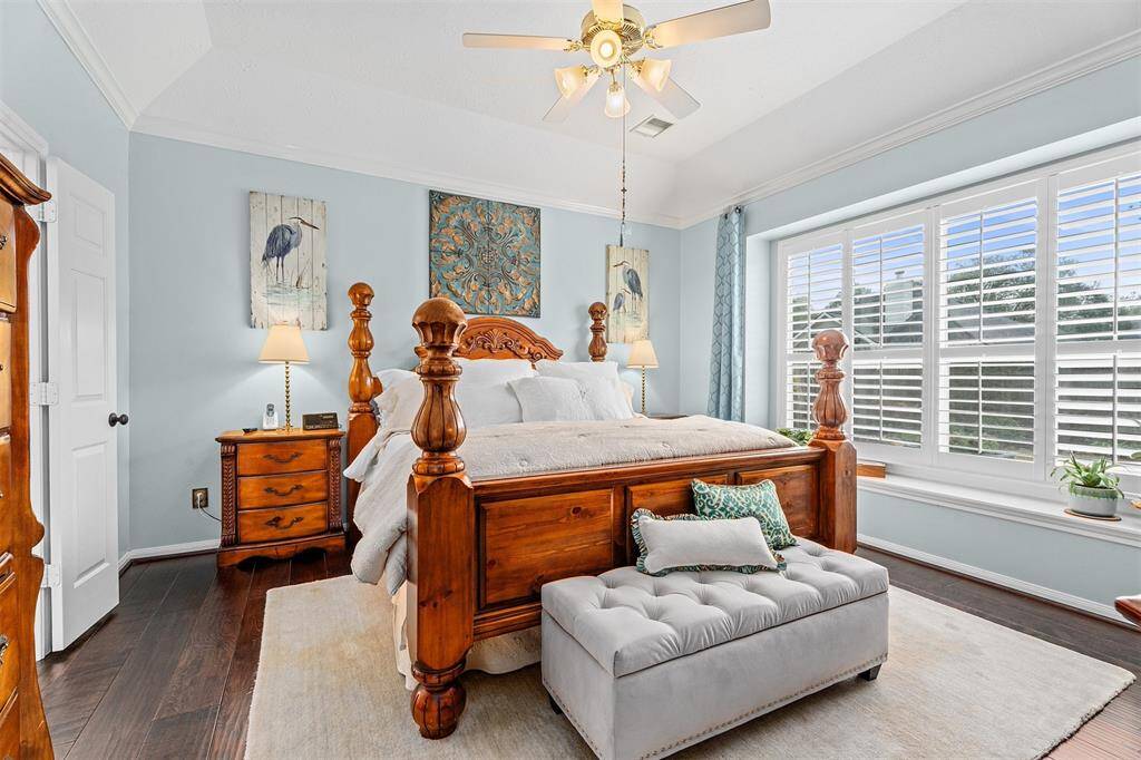 Bright and inviting first-floor primary suite.