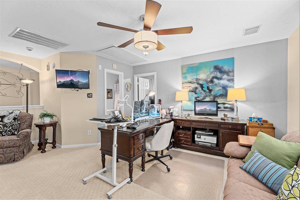 This versatile room is perfect for a study, pool table, or gaming setup.