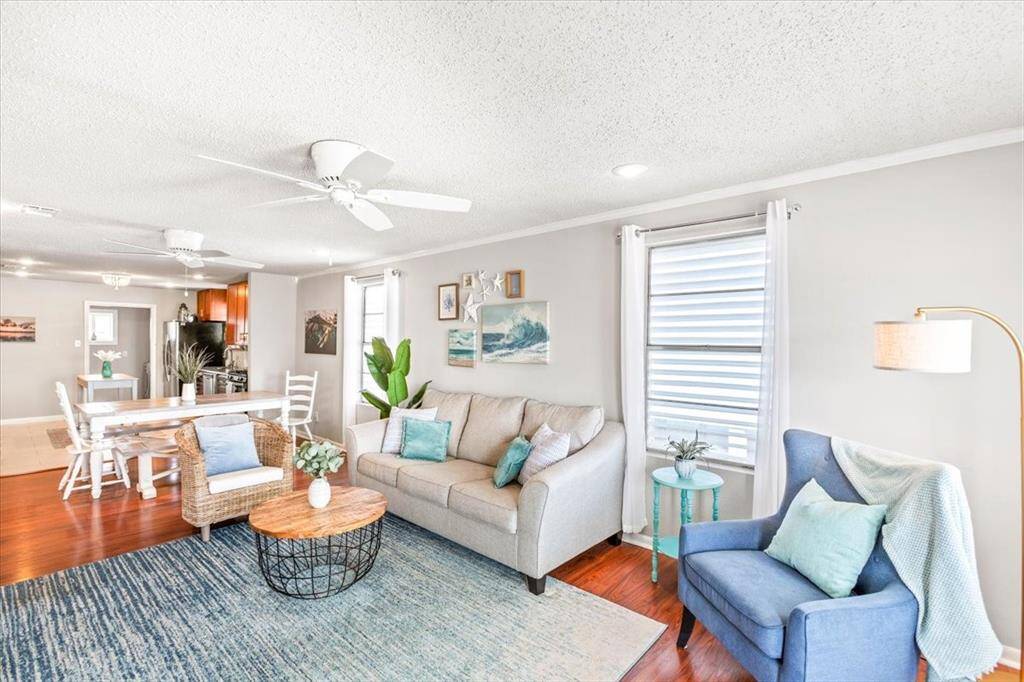 Walk into this bright and open floor plan perfect for hanging out after a long day at the beach!