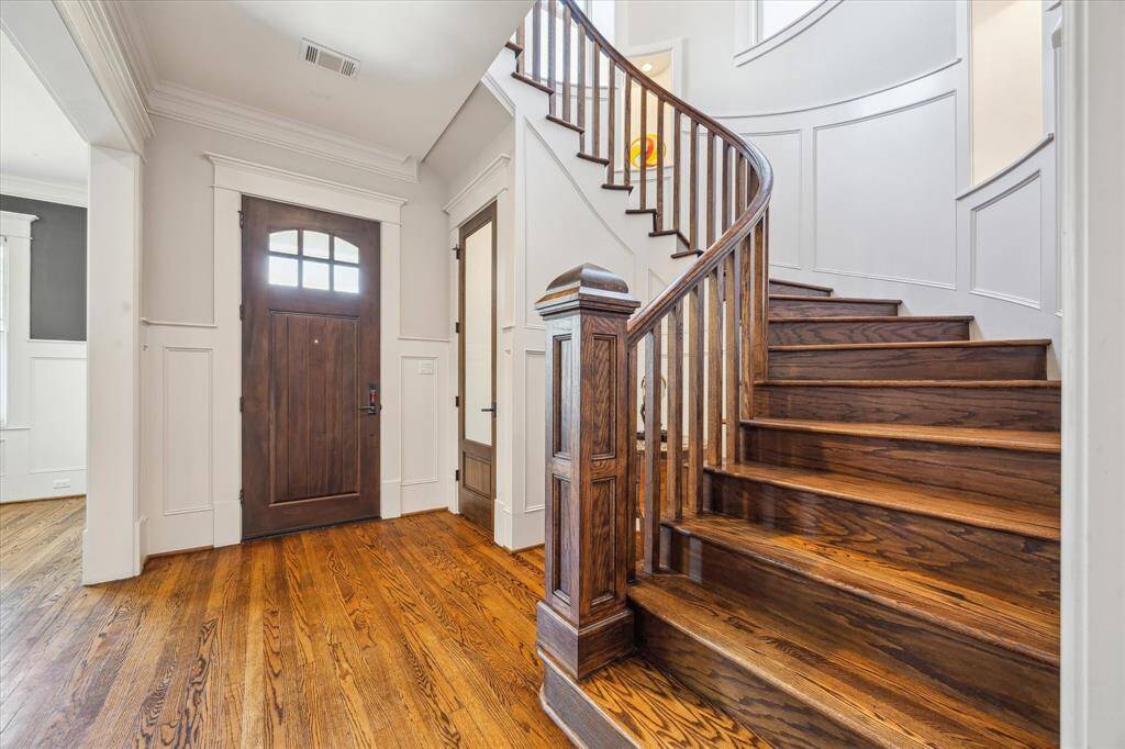 Front entry, storage space underneath stairs.