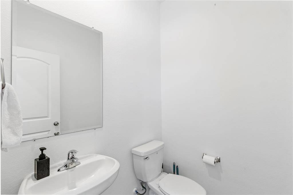Downstairs half bath for guests.