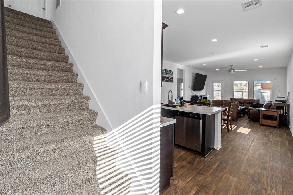 Centrally located stairs leading to the second story.