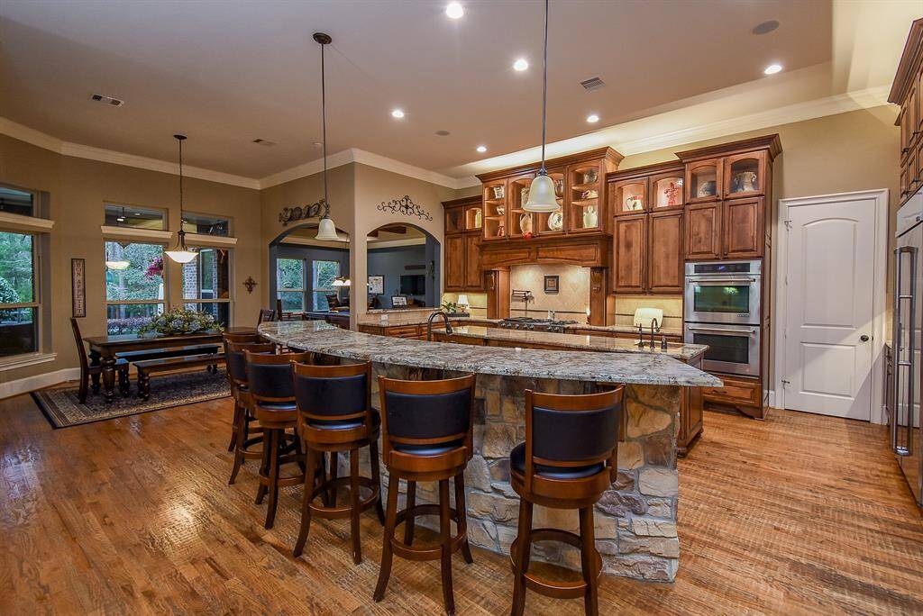 The kitchen, which has seating for 6, is open to the breakfast room and game room.