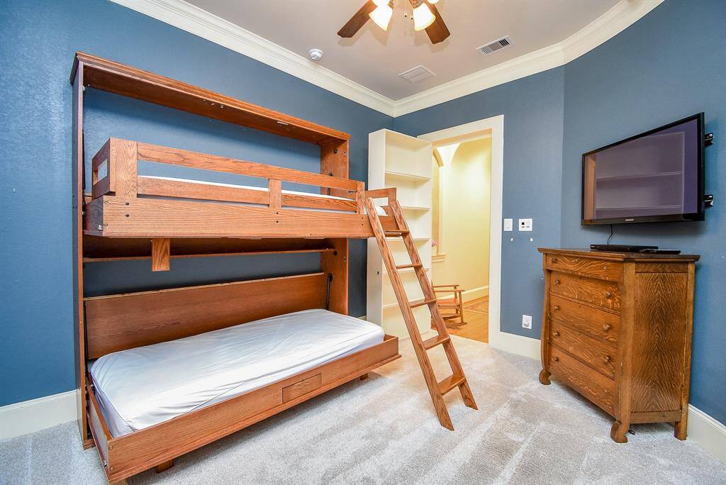 The wall bed stays with the house.