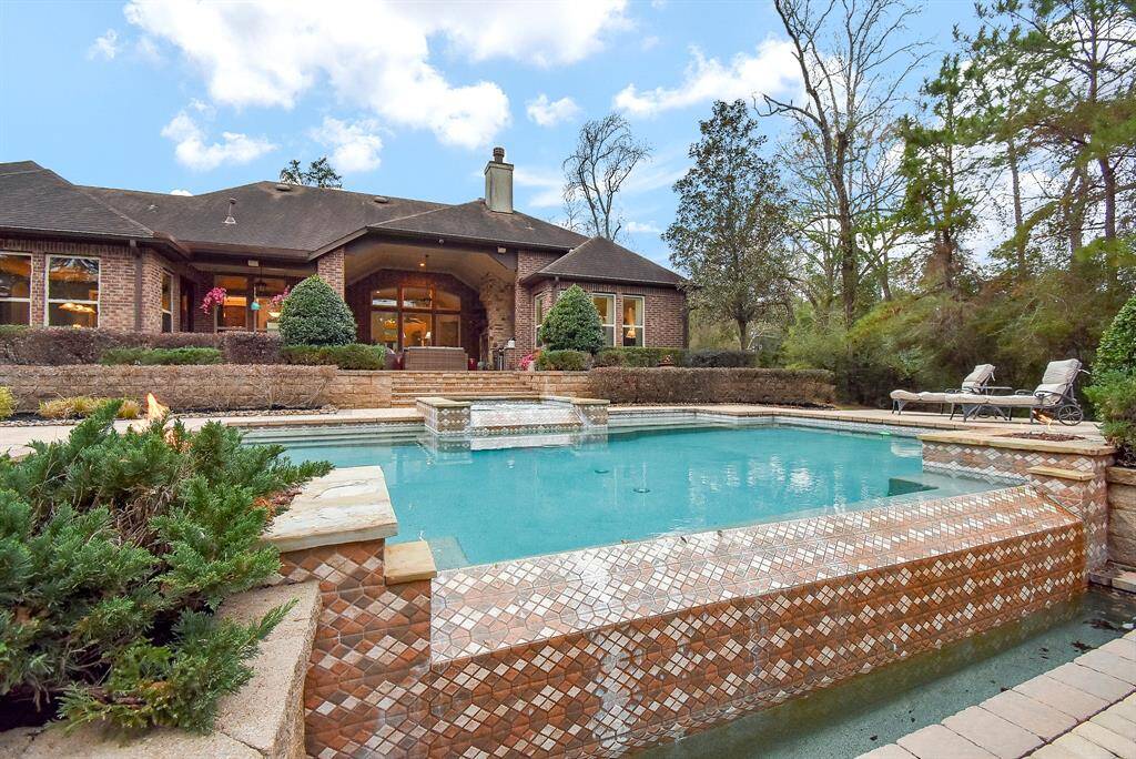 This resort style pool will provide hours of entertainment for all ages. The large, negative edge, heated pool features a tanning ledge, spa and fire pits.