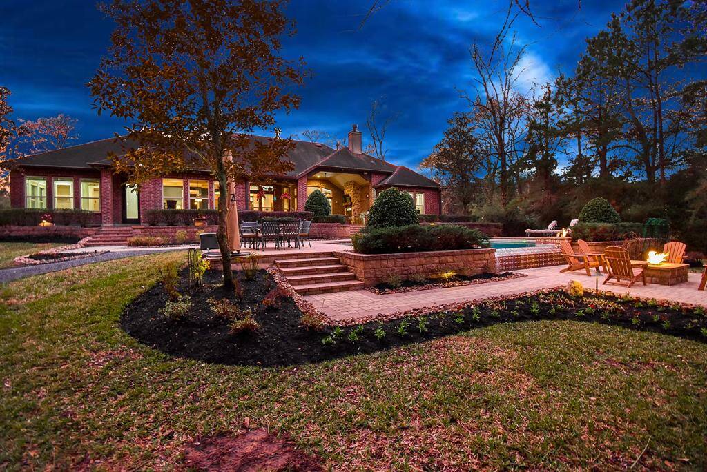 An abundance of hardscape allows for plenty of space for everyone and for alfresco dining by the pool.