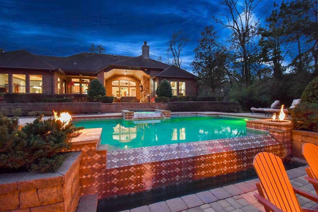 Patio, outdoor kitchen, pool, spa, fire pits... this is the epitome of luxury living with a strong emphasis on outdoor entertainment!
