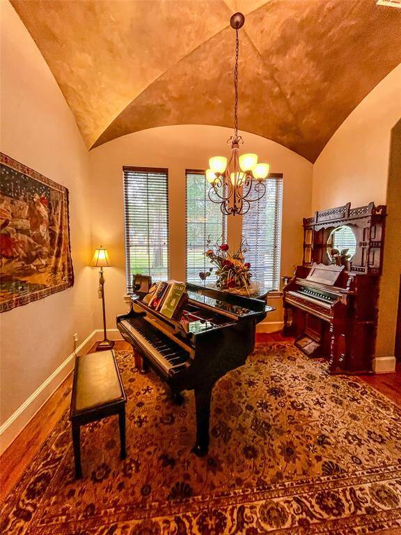 Used as a piano room, this room has a Groin vault ceiling with custom paint.