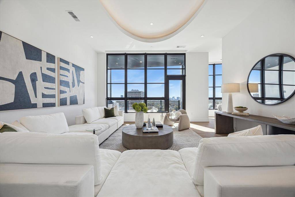 Step into exclusivity--this penthouse residence welcomes you with a bold modern aesthetic that sets the tone for sophisticated living.