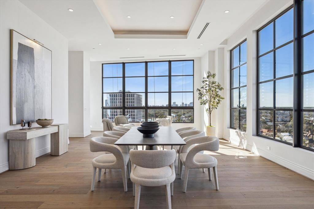 The expansive dining area is perfectly suited for a large table for hosting gatherings of any size.