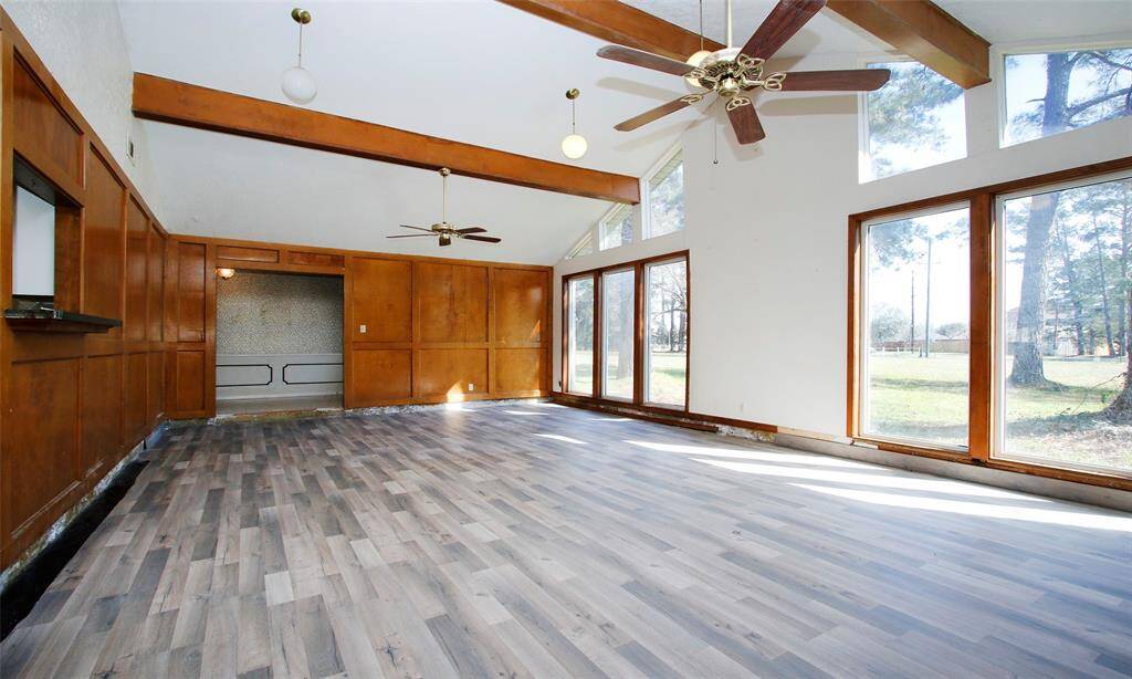 Features 2 fans and wood burning fireplace.