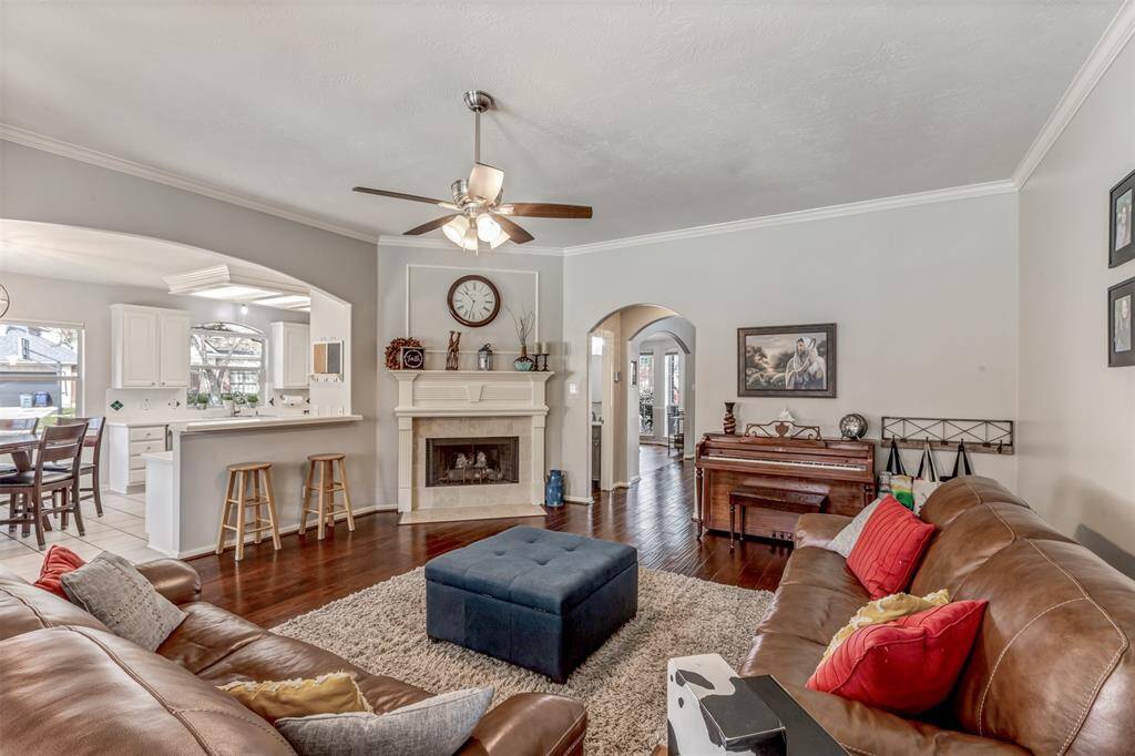 Great touches everywhere like the eye catching mantle and trim work make this room shine.